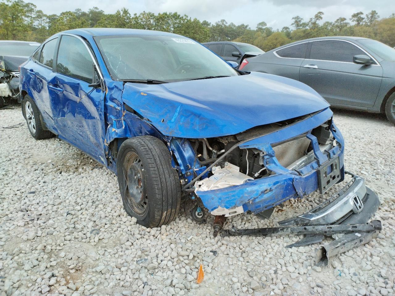 HONDA CIVIC LX 2018 with VIN 2HGFC2F51JH577330 - Photo from auction