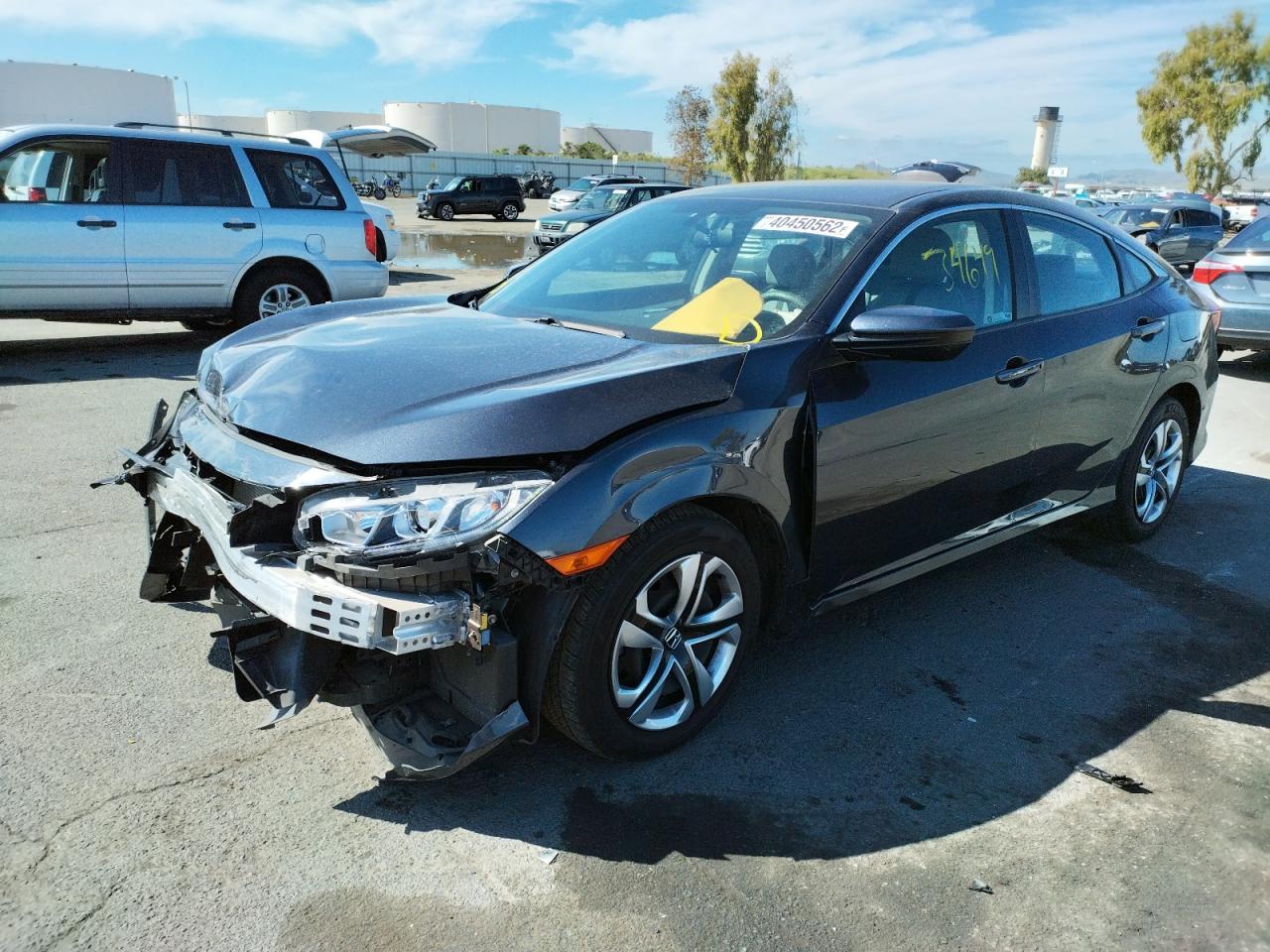 Photo 2 from auction – 2018 HONDA CIVIC LX with VIN 2HGFC2F52JH559760