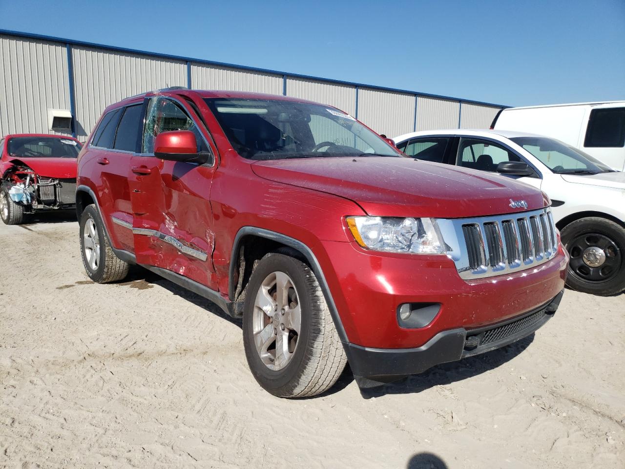 JEEP GRAND CHER 2011 with VIN 1J4RR4GGXBC656838 - Photo from auction