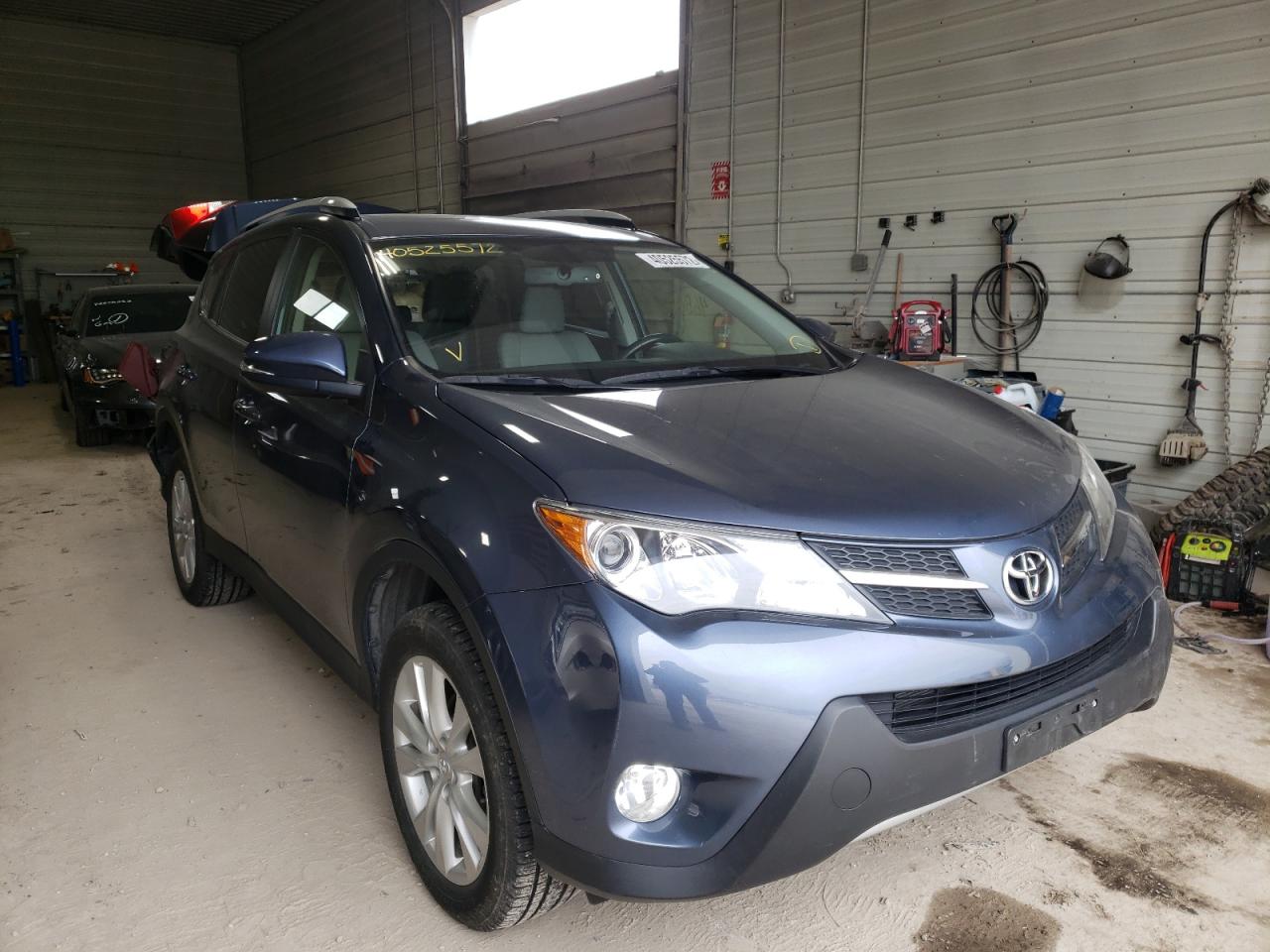 TOYOTA RAV4 LIMIT 2014 with VIN JTMDFREV3ED065529 - Photo from auction
