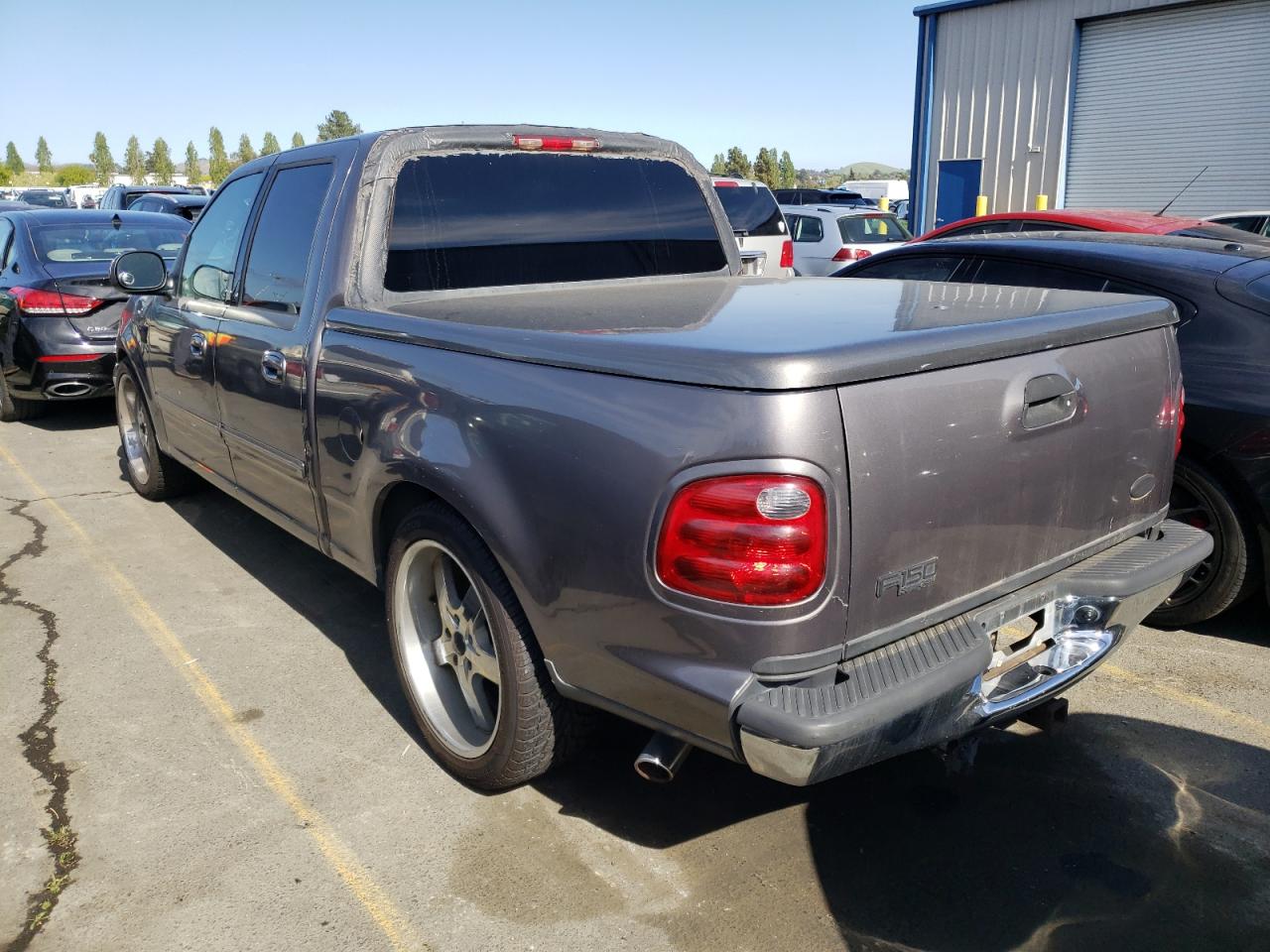 Photo 3 from auction – 2003 FORD F-150 with VIN 1FTRW076X3KB93377