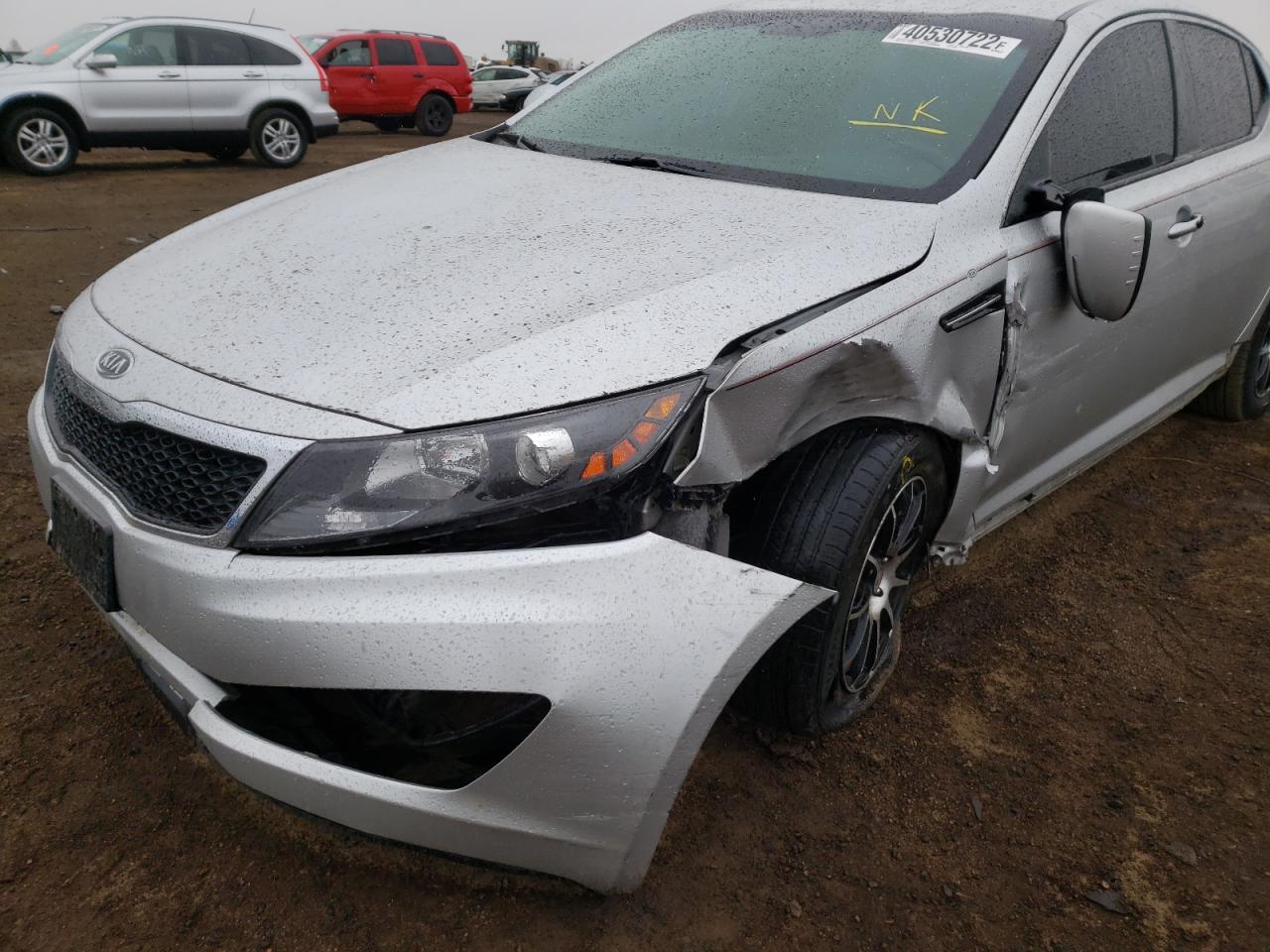 Photo 9 from auction – 2011 KIA OPTIMA LX with VIN KNAGM4A77B5078901