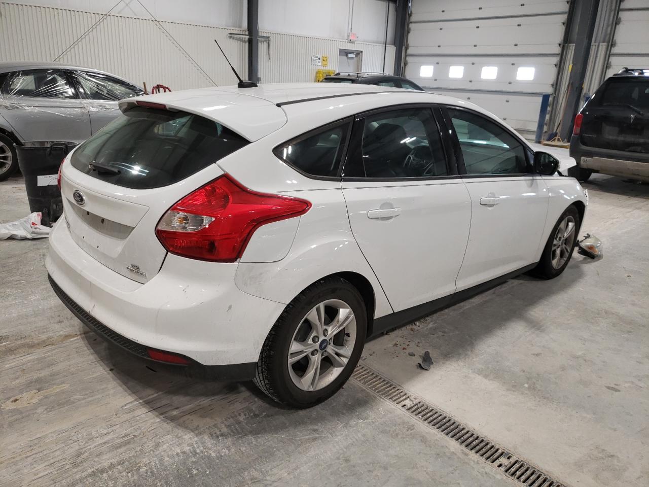 Photo 4 from auction – 2014 FORD FOCUS SE with VIN 1FADP3K26EL225371
