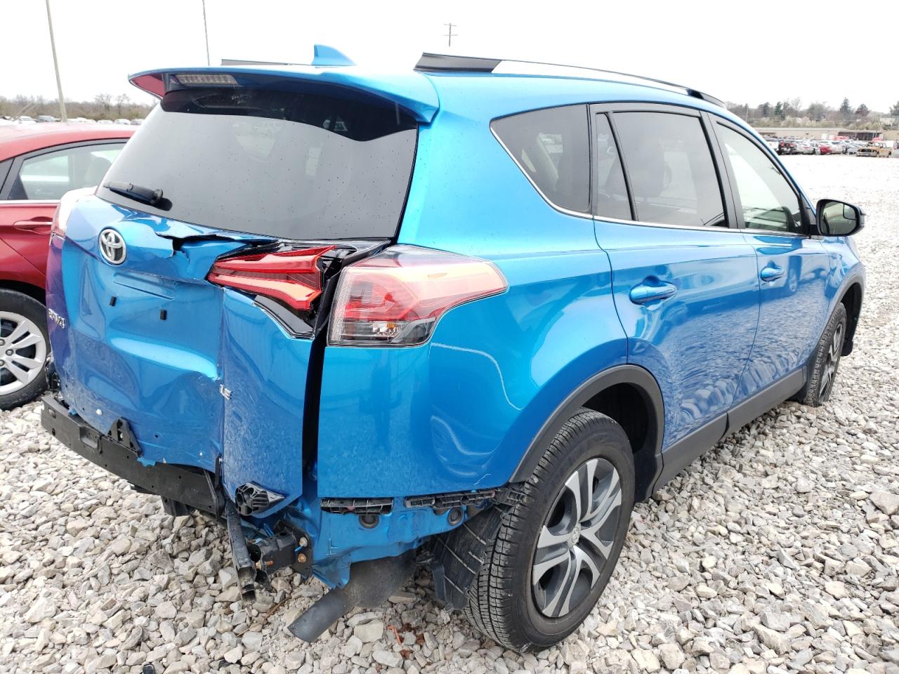 Photo 4 from auction – 2018 TOYOTA RAV4 LE with VIN JTMZFREV1JD131964