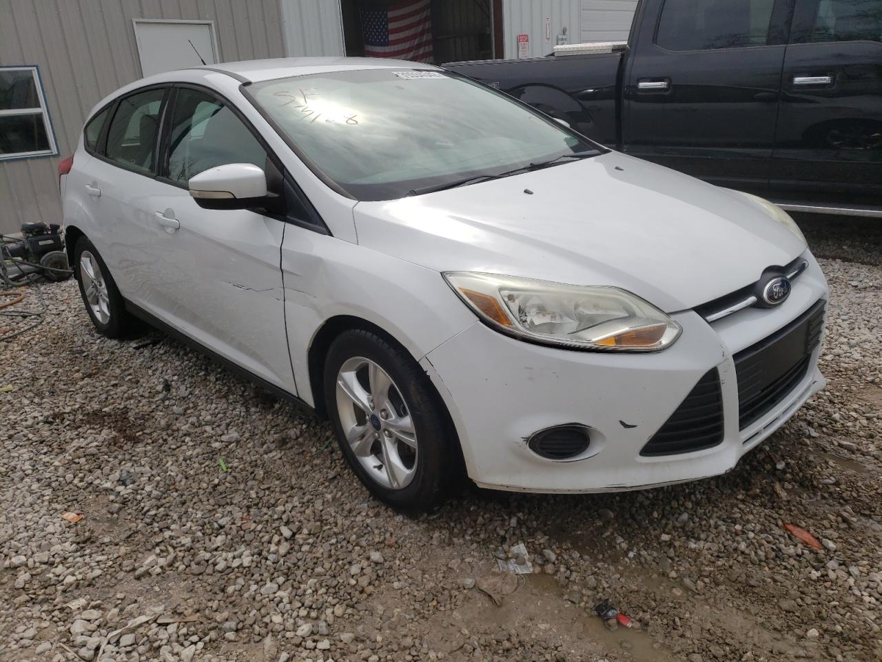 FORD FOCUS SE 2013 with VIN 1FADP3K21DL237264 - Photo from auction