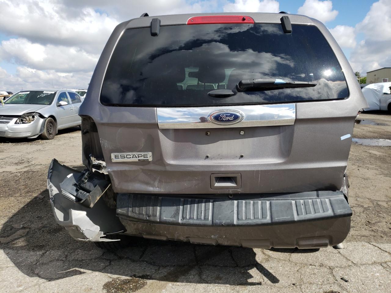 Photo 9 from auction – 2011 FORD ESCAPE LIM with VIN 1FMCU0E70BKC25030