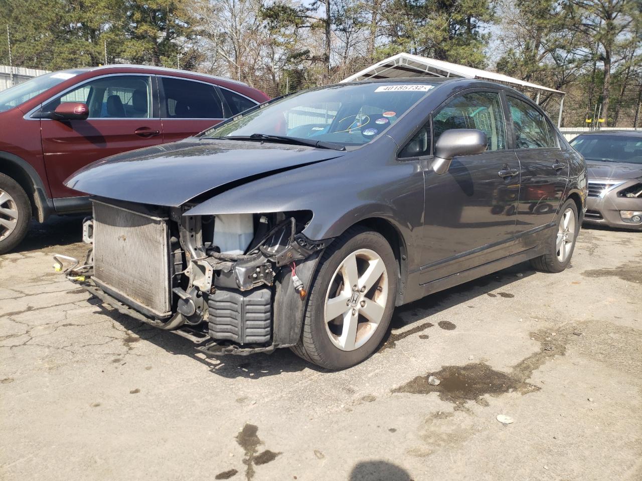Photo 2 from auction – 2011 HONDA CIVIC LX-S with VIN 19XFA1F67BE009569