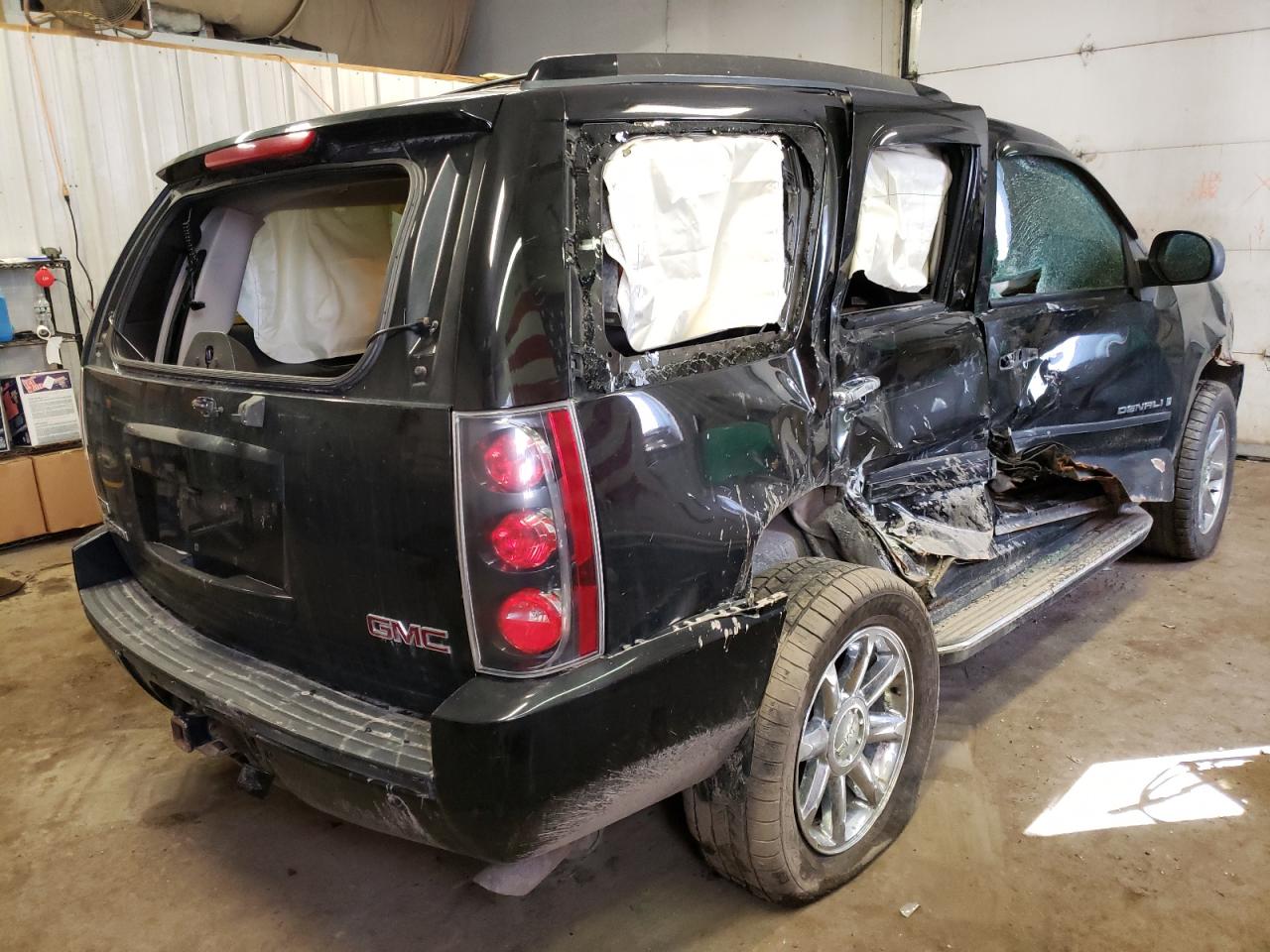 Photo 4 from auction – 2009 GMC YUKON DENA with VIN 1GKFK032X9R129748
