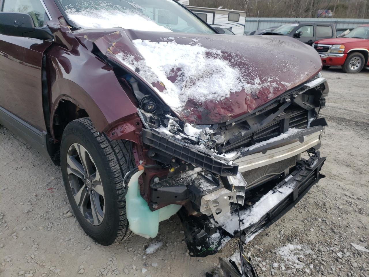 Photo 9 from auction – 2017 HONDA CR-V LX with VIN 7FARW5H39HE010271