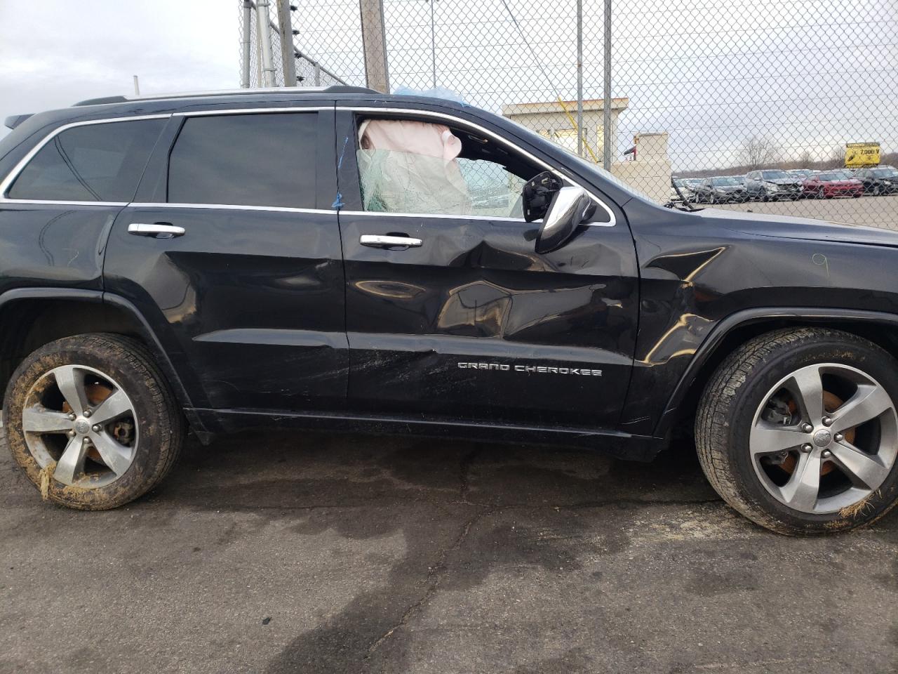 Photo 9 from auction – 2014 JEEP GRAND CHER with VIN 1C4RJFCG4EC178791