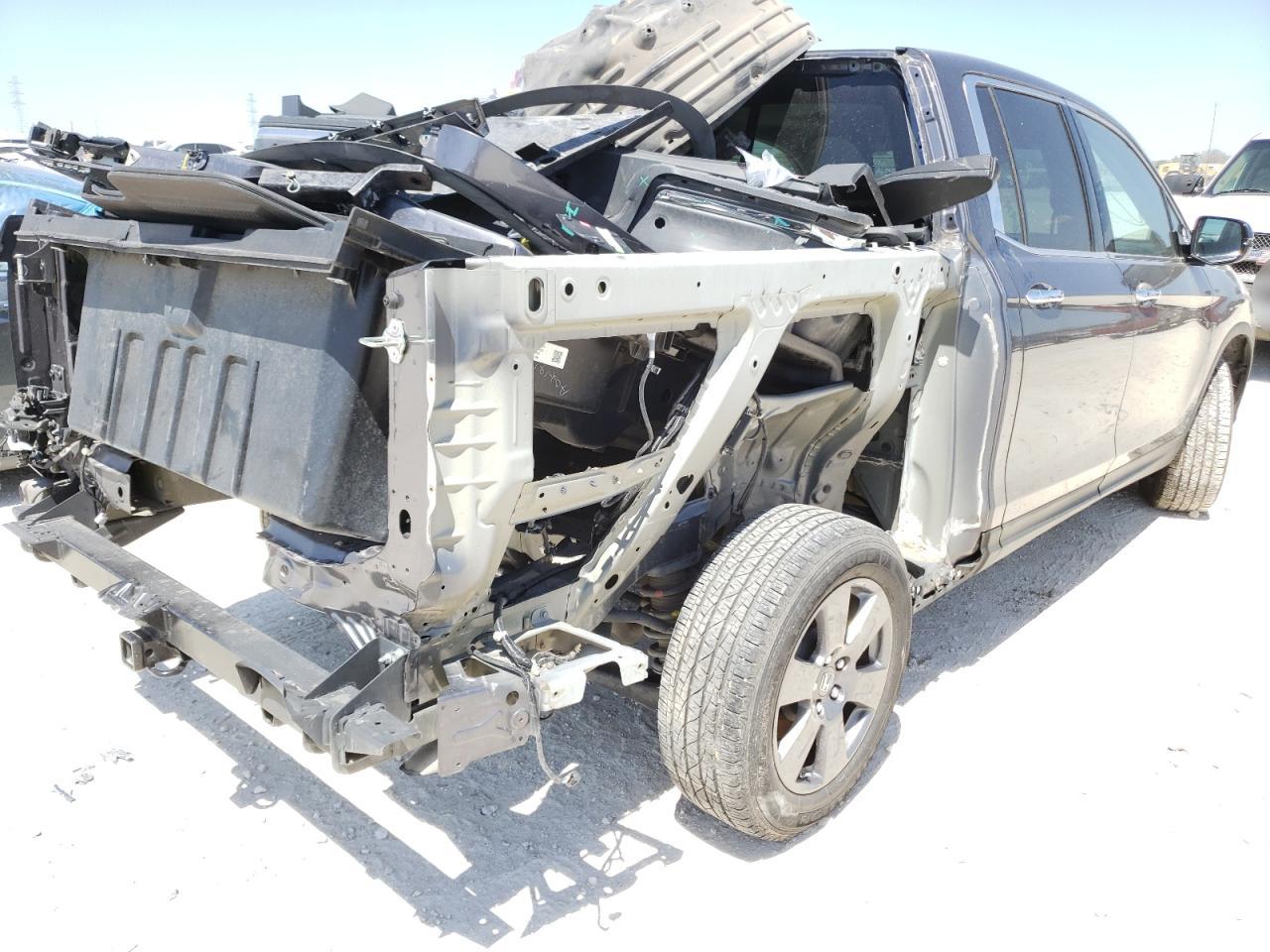 Photo 9 from auction – 2020 HONDA RIDGELINE with VIN 5FPYK3F75LB007249