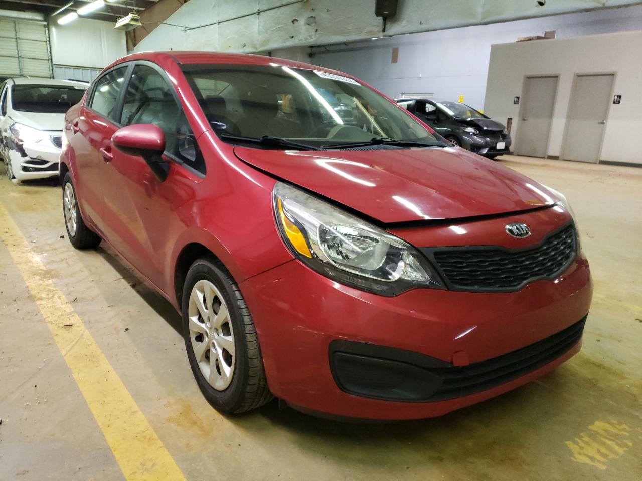 KIA RIO LX 2014 with VIN KNADM4A33E6355347 - Photo from auction