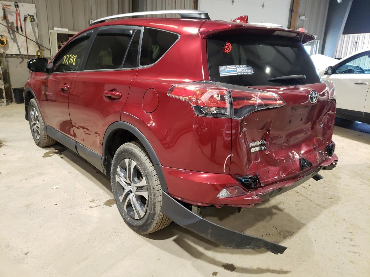 Photo 3 from auction – 2018 TOYOTA RAV4 LE with VIN 2T3ZFREVXJW521965