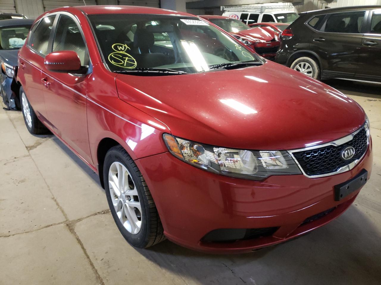 KIA FORTE EX 2011 with VIN KNAFU5A24B5403641 - Photo from auction