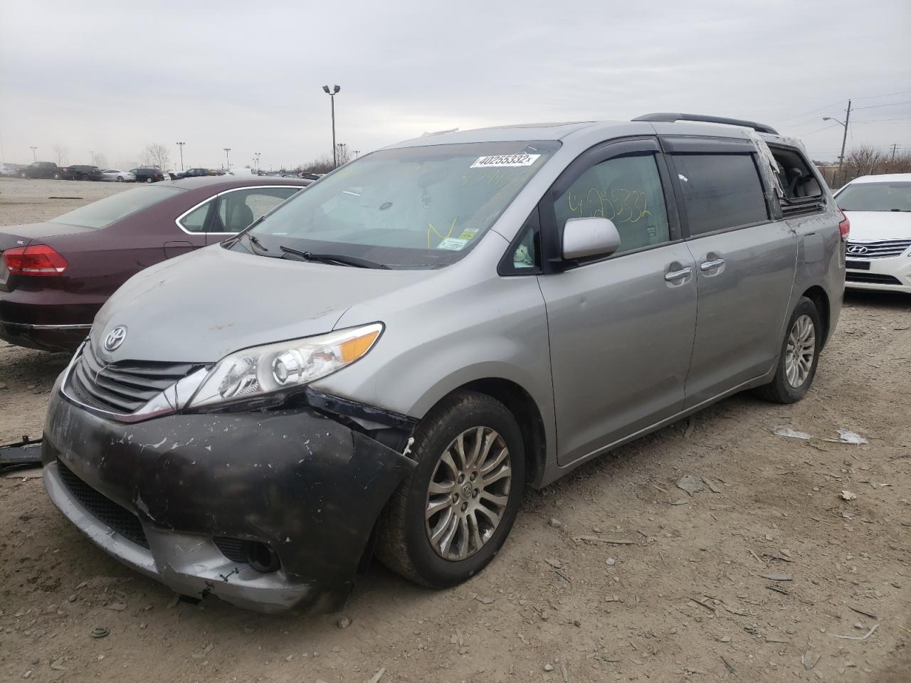 Photo 2 from auction – 2014 TOYOTA SIENNA XLE with VIN 5TDYK3DC7ES459937