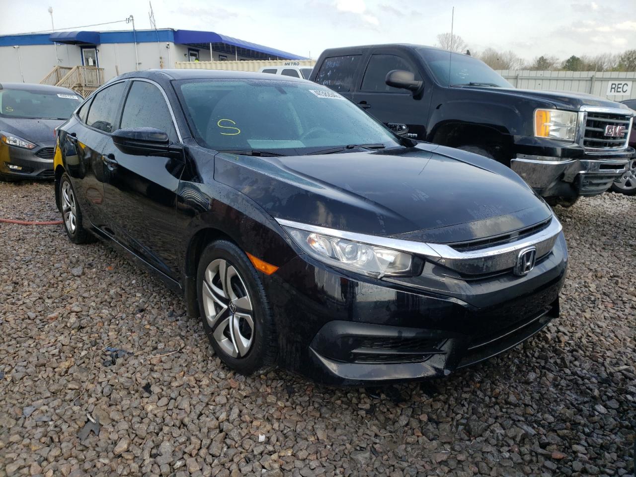 HONDA CIVIC LX 2018 with VIN 19XFC2F57JE011649 - Photo from auction