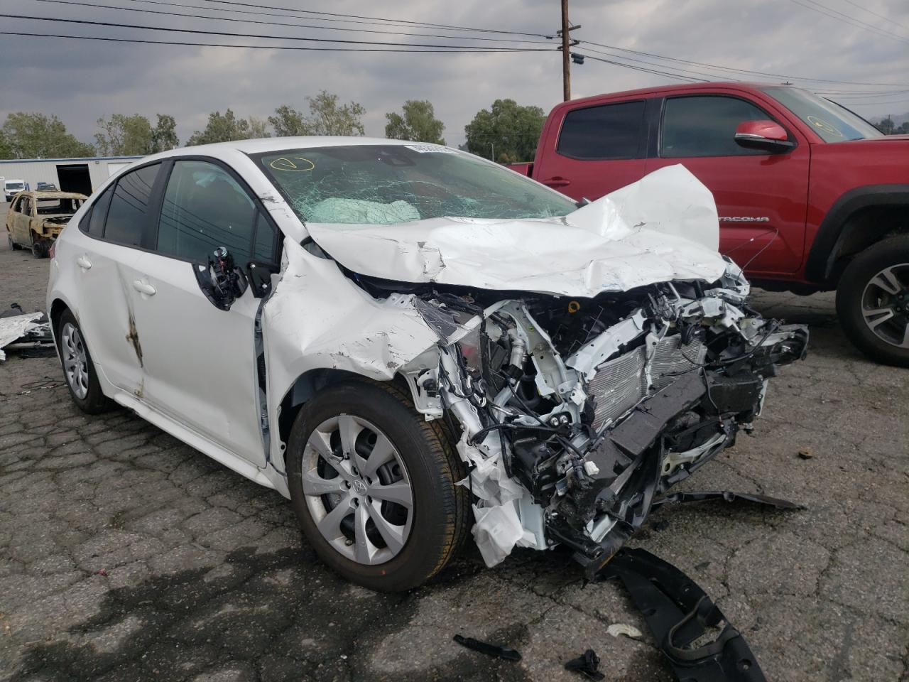 TOYOTA COROLLA LE 2022 with VIN 5YFEPMAE1NP296498 - Photo from auction