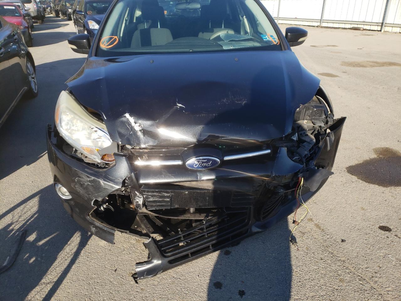 Photo 9 from auction – 2012 FORD FOCUS SEL with VIN 1FAHP3M24CL107153