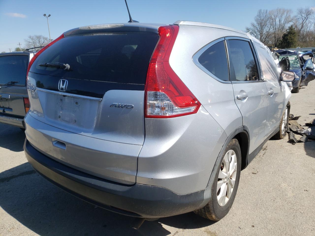 Photo 4 from auction – 2013 HONDA CR-V EXL with VIN 2HKRM4H75DH662265