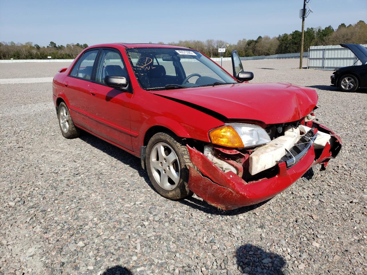 MAZDA PROTEGE ES 2000 with VIN JM1BJ2218Y0282147 - Photo from auction