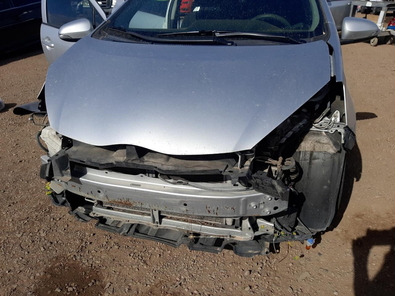 Photo 9 from auction – 2012 TOYOTA PRIUS C with VIN JTDKDTB38C1004429
