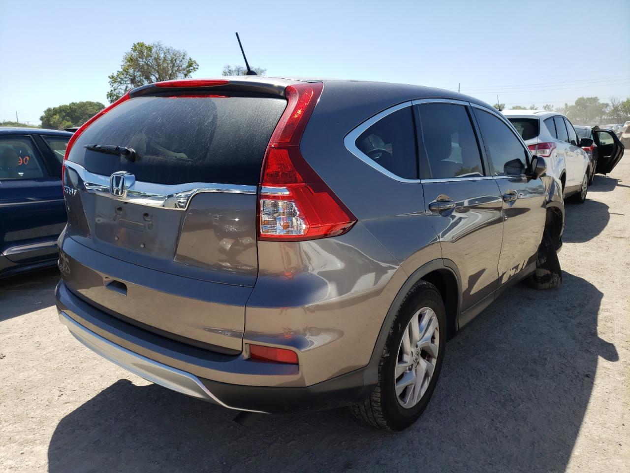 Photo 4 from auction – 2015 HONDA CR-V EX with VIN 3CZRM3H53FG709579