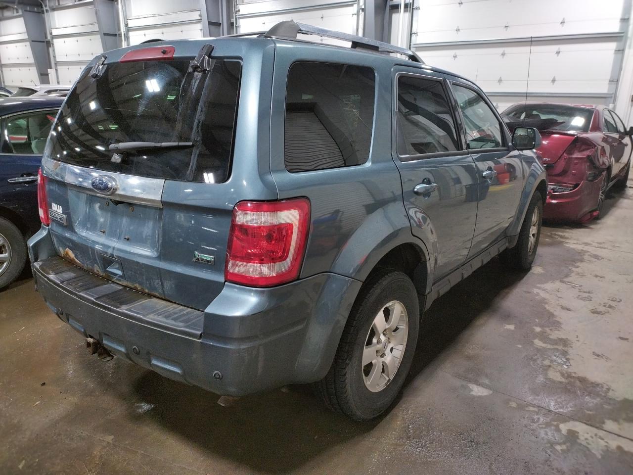 Photo 4 from auction – 2011 FORD ESCAPE LIM with VIN 1FMCU9EG7BKA38467
