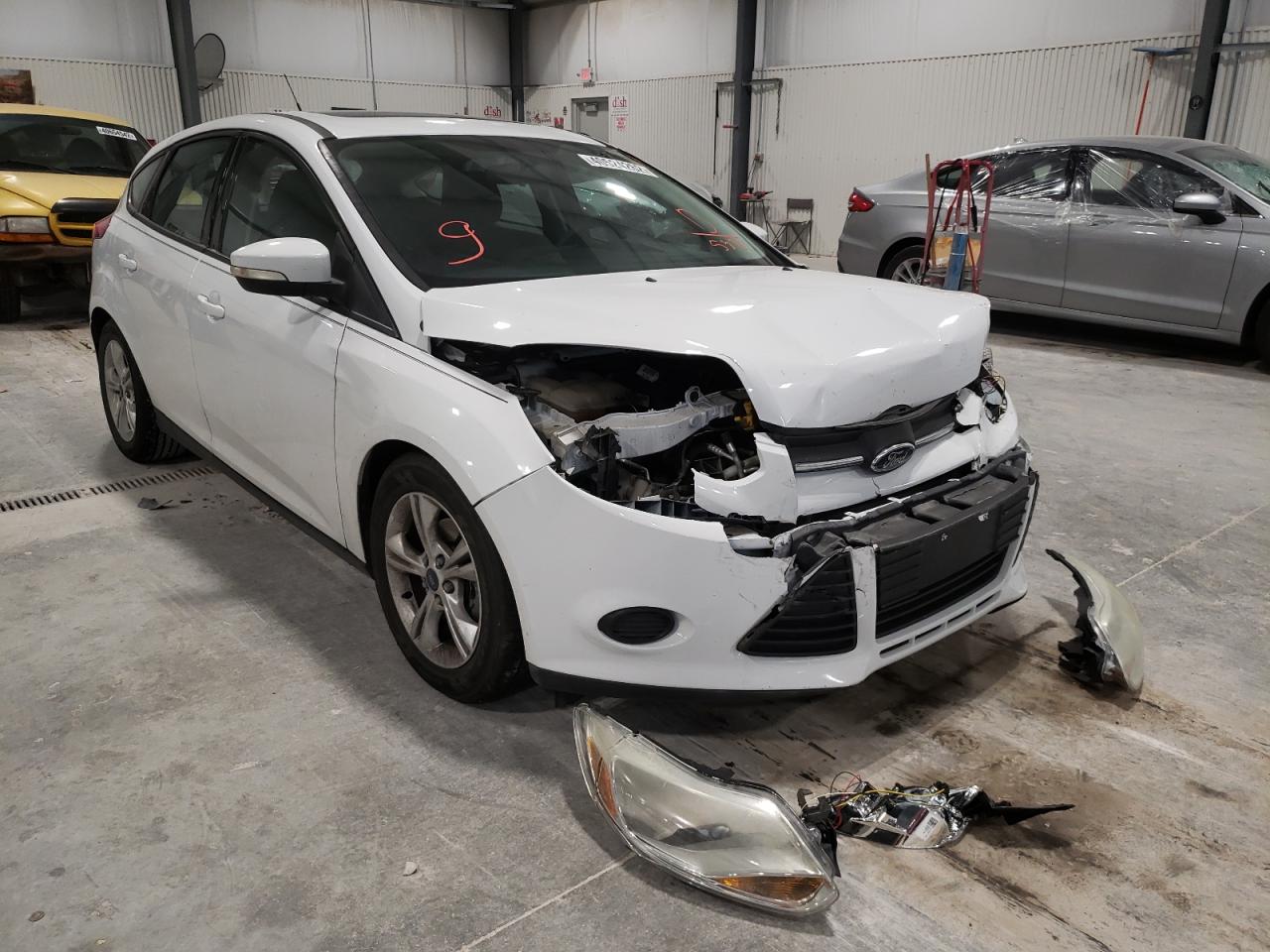 FORD FOCUS SE 2014 with VIN 1FADP3K26EL225371 - Photo from auction