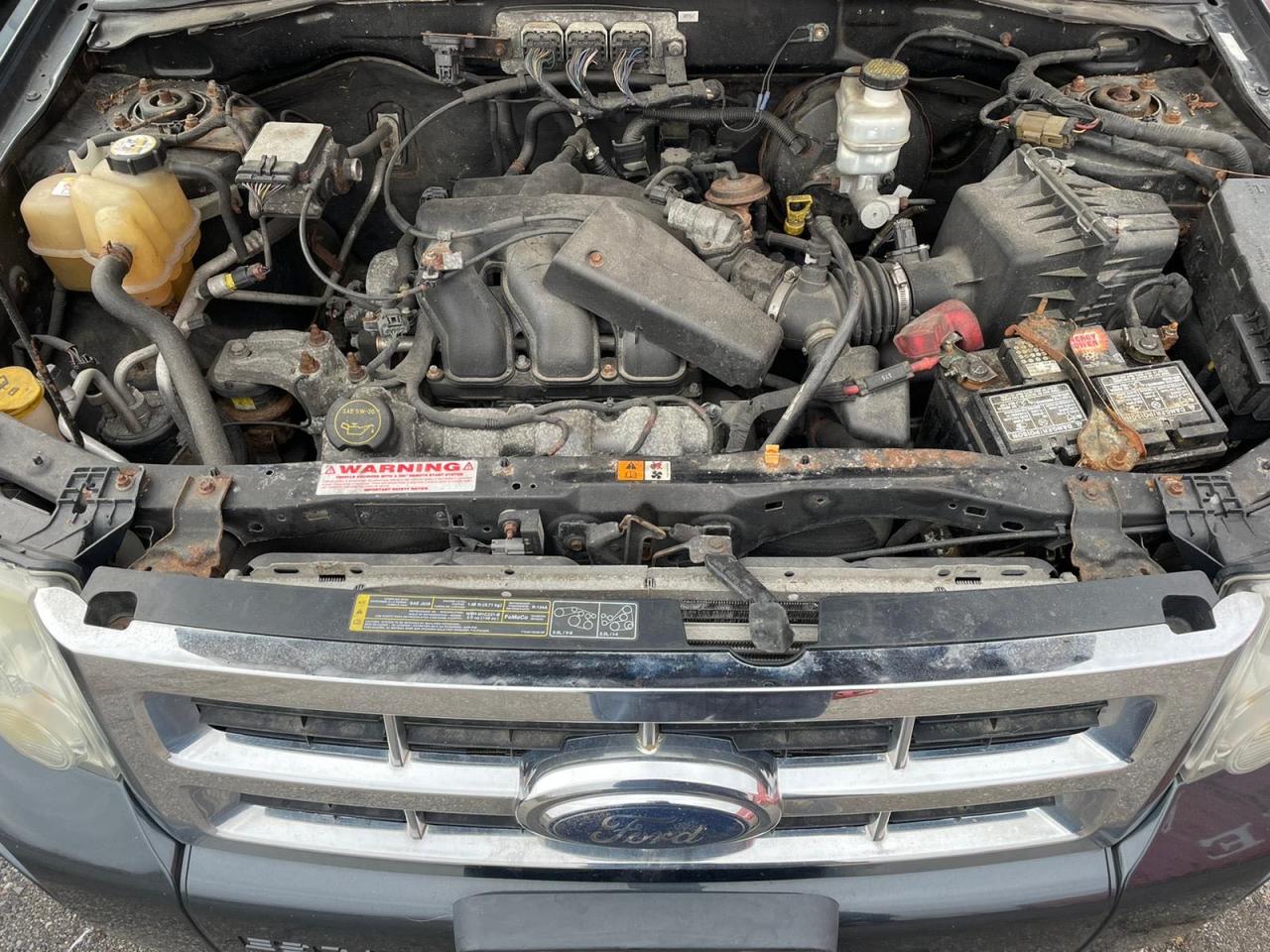 Photo 7 from auction – 2008 FORD ESCAPE XLT with VIN 1FMCU93128KB75744