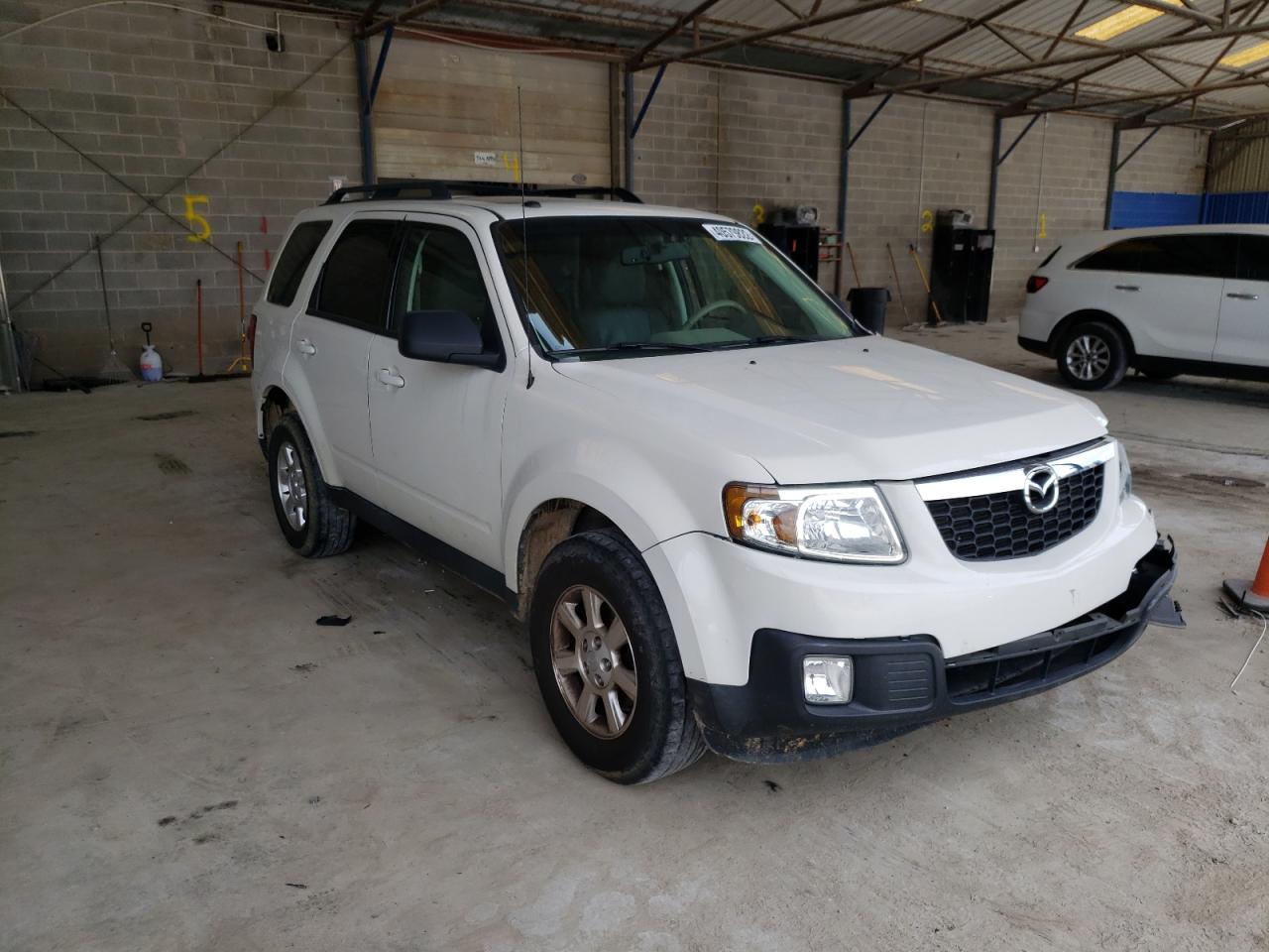 MAZDA TRIBUTE I 2010 with VIN 4F2CY0C77AKM02800 - Photo from auction