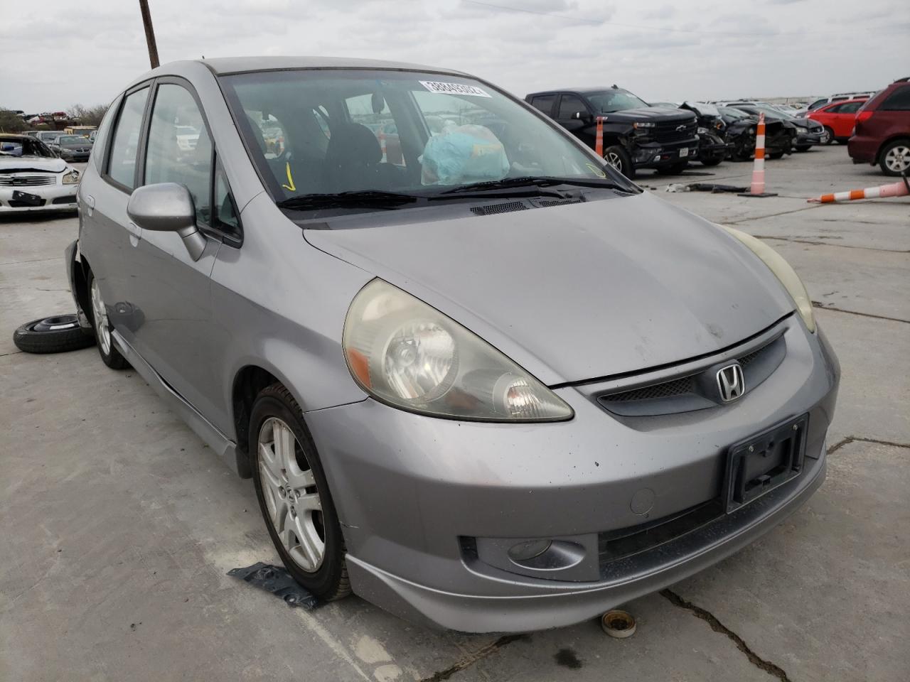 HONDA FIT S 2007 with VIN JHMGD38677S015671 - Photo from auction