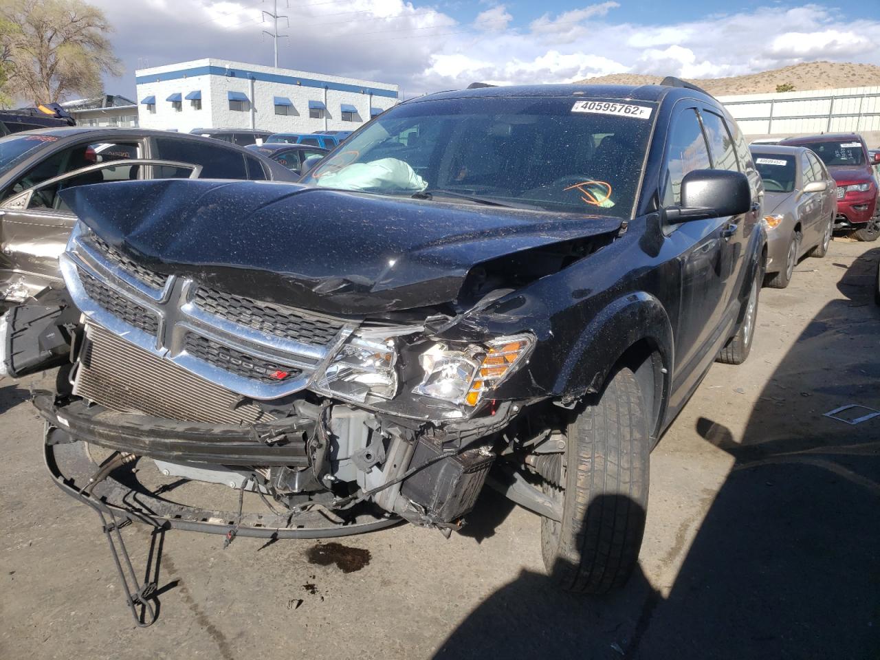 Photo 2 from auction – 2017 DODGE JOURNEY SE with VIN 3C4PDCAB9HT700795