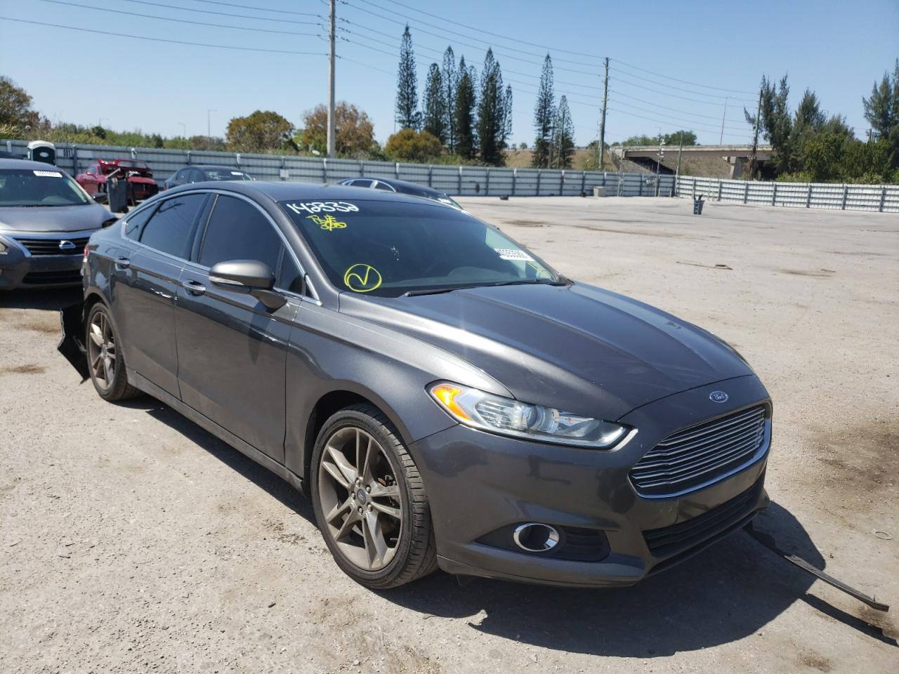 FORD FUSION TIT 2016 with VIN 3FA6P0K97GR142332 - Photo from auction