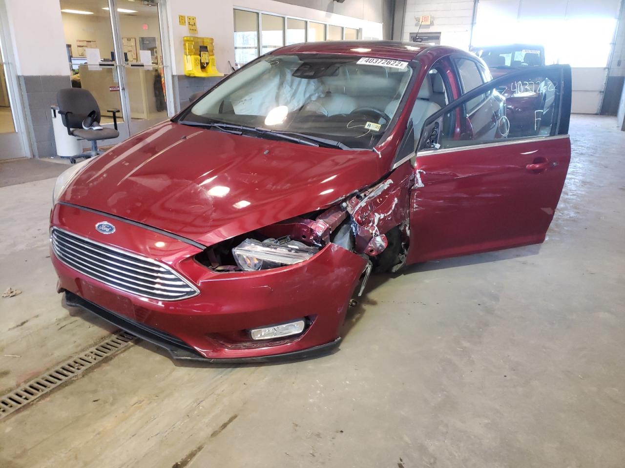 Photo 2 from auction – 2016 FORD FOCUS TITA with VIN 1FADP3N24GL207613