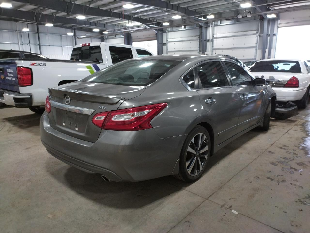 Photo 4 from auction – 2016 NISSAN ALTIMA 2.5 with VIN 1N4AL3AP5GC204140