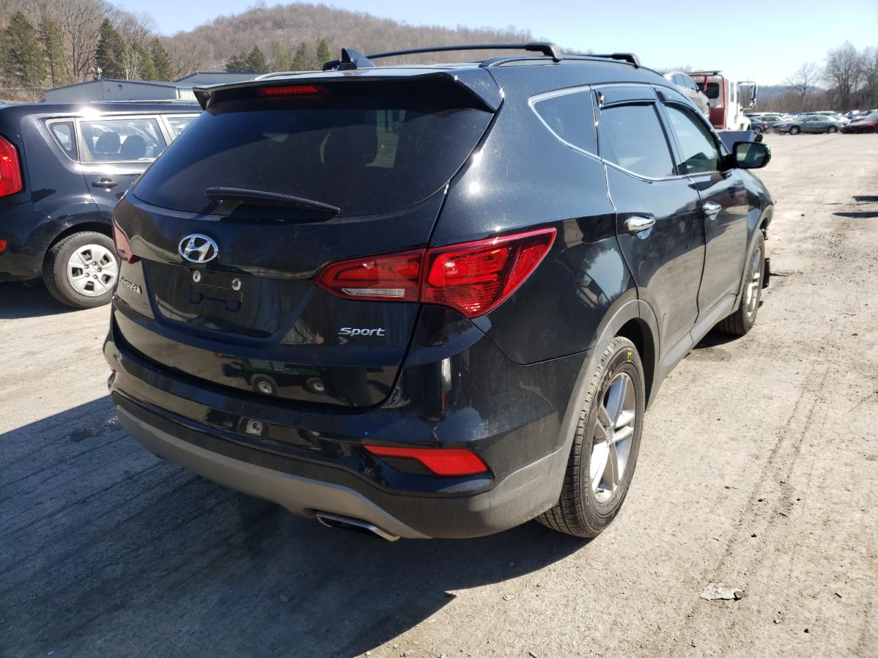 Photo 14 from auction – 2017 HYUNDAI SANTA FE S with VIN 5NMZU3LB7HH049461