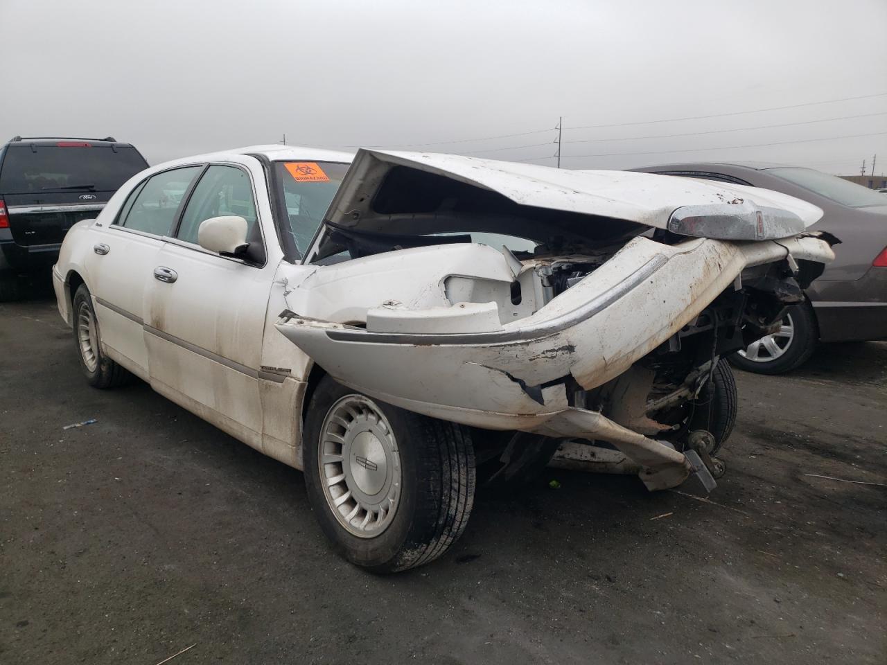Photo 1 from auction – 1998 LINCOLN TOWN CAR E with VIN 1LNFM81W2WY655136
