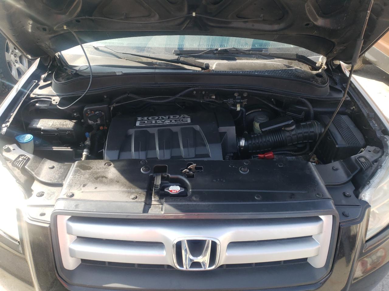 Photo 7 from auction – 2006 HONDA PILOT EX with VIN 5FNYF28476B028926