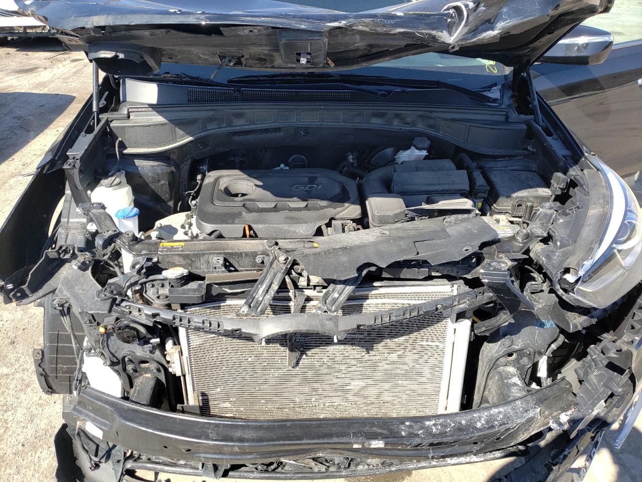 Photo 17 from auction – 2017 HYUNDAI SANTA FE S with VIN 5NMZU3LB7HH049461