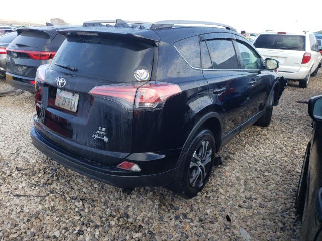 Photo 4 from auction – 2018 TOYOTA RAV4 LE with VIN 2T3BFREV1JW821251