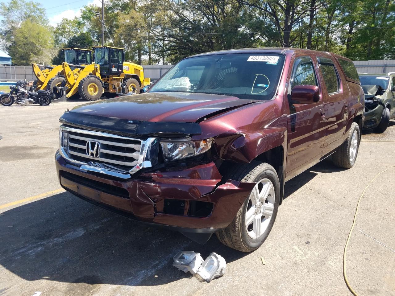 Photo 2 from auction – 2013 HONDA RIDGELINE with VIN 5FPYK1F59DB015746