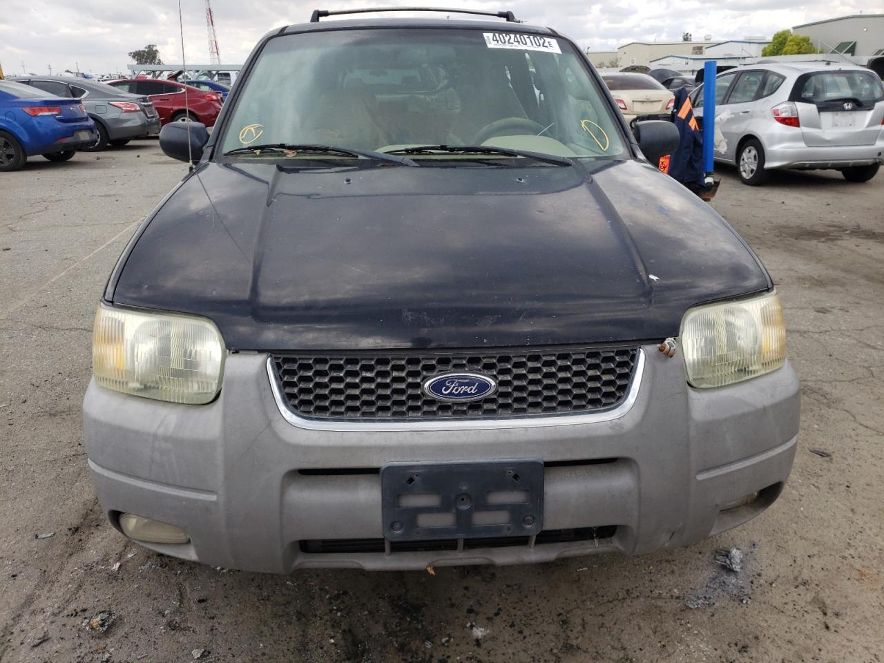 Photo 9 from auction – 2001 FORD ESCAPE with VIN 1FMCU031X1KC22648