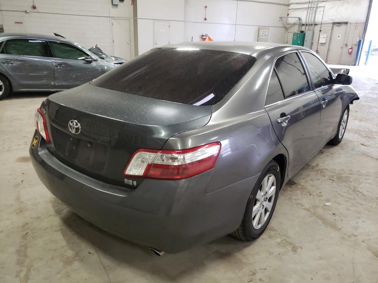 Photo 4 from auction – 2007 TOYOTA CAMRY HYBR with VIN JTNBB46K573024317