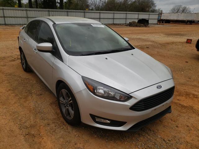 FORD FOCUS SE 2018 with VIN 1FADP3FE2JL216715 - Photo from auction