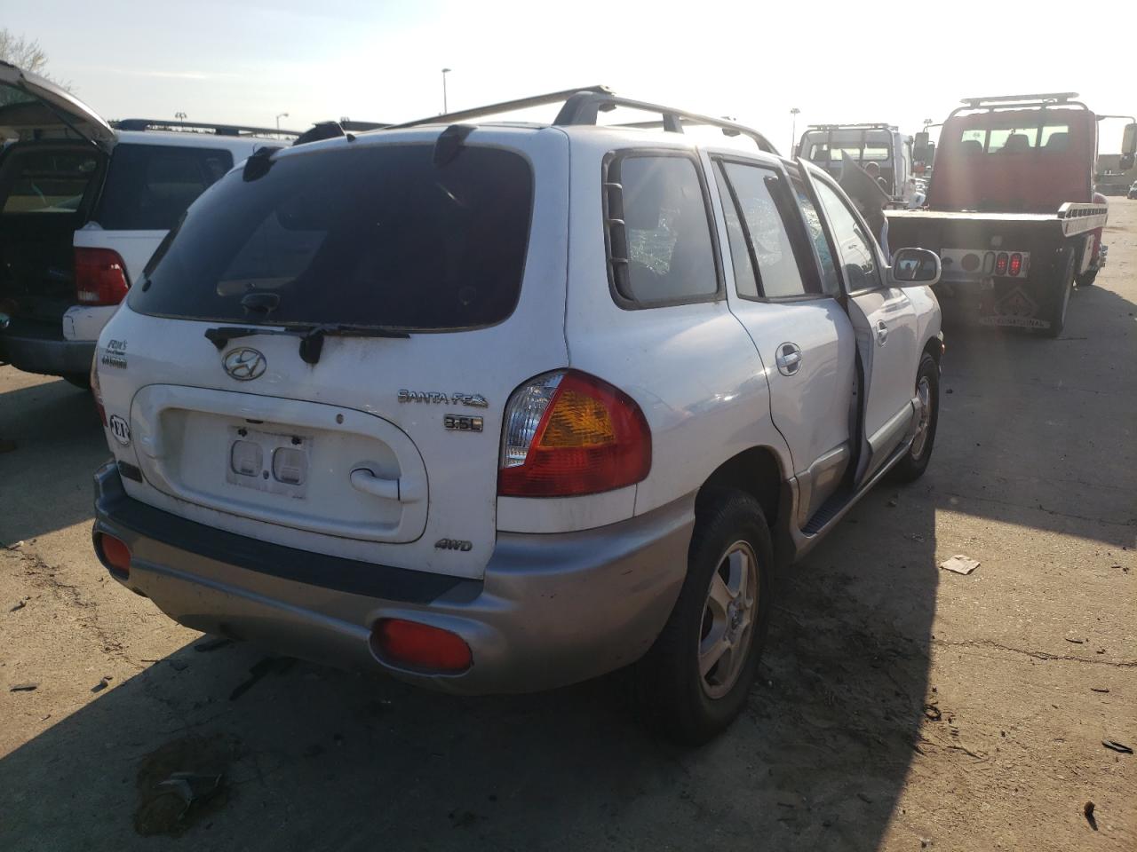 Photo 4 from auction – 2004 HYUNDAI SANTA FE with VIN KM8SC73E74U705100