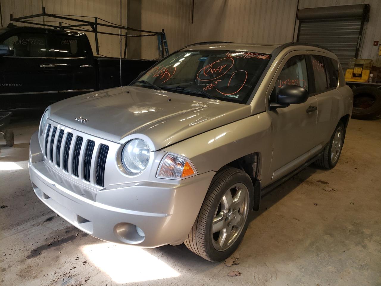 Photo 2 from auction – 2009 JEEP COMPASS LI with VIN 1J4FT57B79D173892