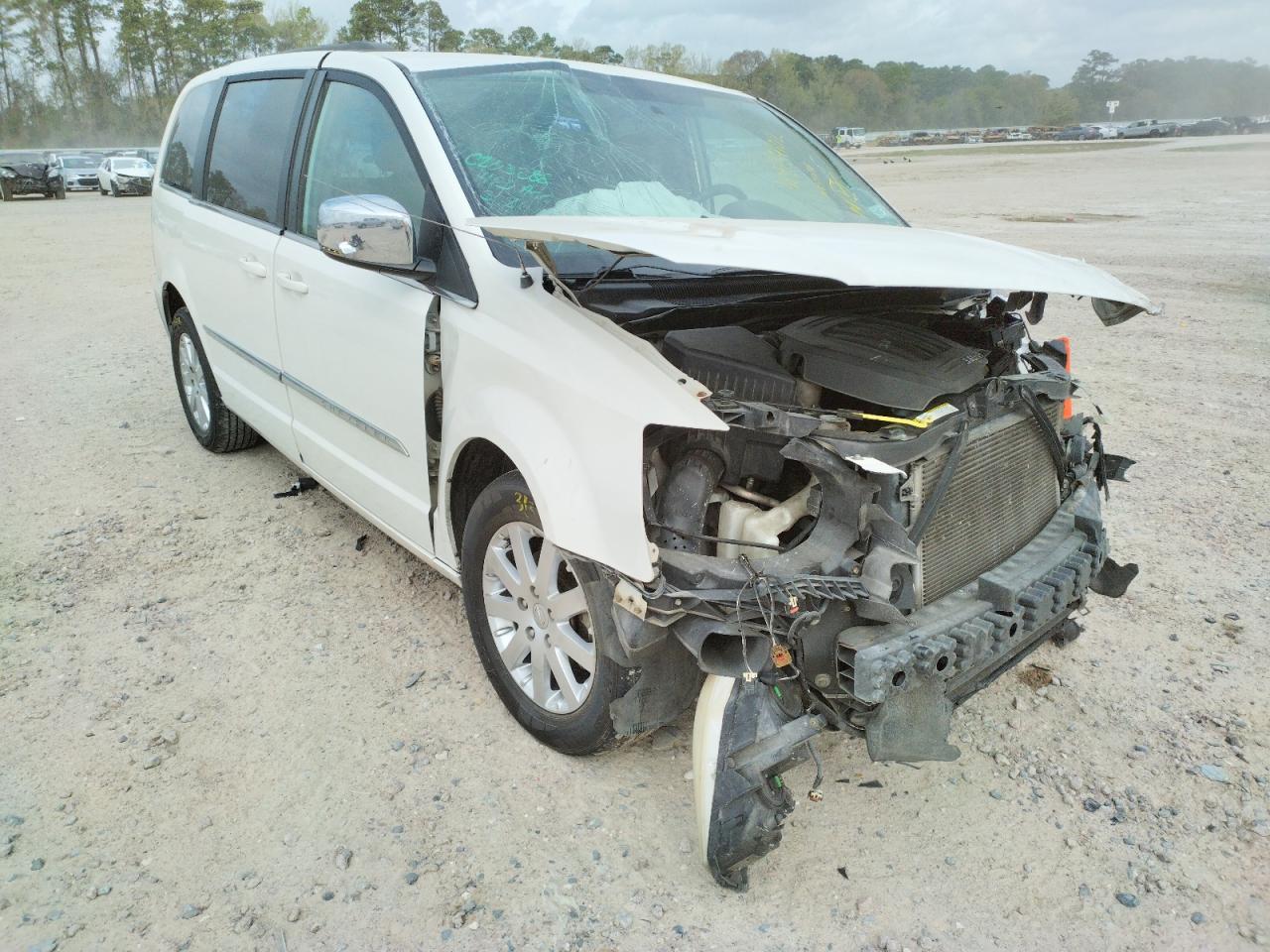 CHRYSLER TOWN & COU 2011 with VIN 2A4RR8DG4BR704160 - Photo from auction