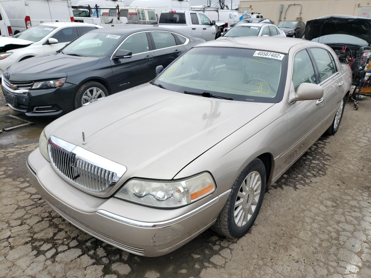 Photo 2 from auction – 2003 LINCOLN TOWN CAR E with VIN 1LNHM81W23Y674175