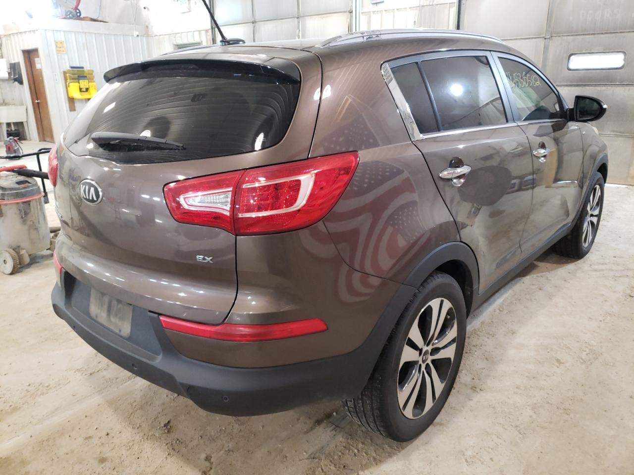 Photo 4 from auction – 2013 KIA SPORTAGE E with VIN KNDPCCA29D7469429