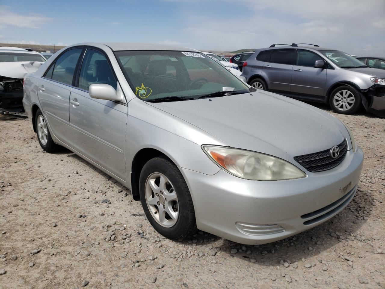 TOYOTA CAMRY LE 2002 with VIN 4T1BE32K32U636073 - Photo from auction